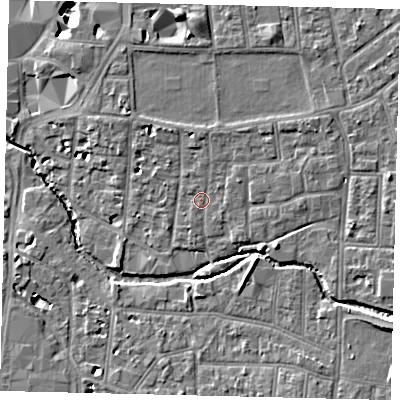 Shaded relief map of the ground around KT12RF, computed from Environment Agency LiDAR. The ground here sits at about 9 m above sea level and falls 11 m across the surrounding 800 m. Surface water reaching this point runs off ground lying to the north-east, 1.4 m higher.
