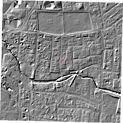 Shaded relief map of the ground around KT12RG, computed from Environment Agency LiDAR. The ground here sits at about 9 m above sea level and falls 11 m across the surrounding 800 m. Surface water reaching this point runs off ground lying to the north-east, 1.4 m higher.