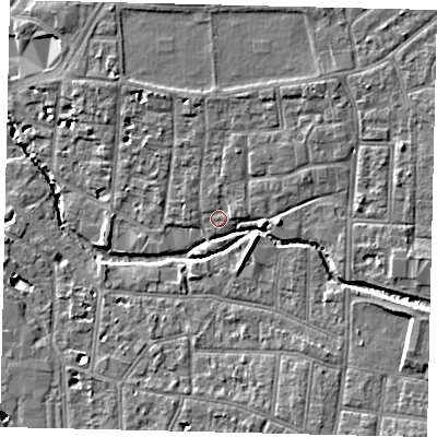 Shaded relief map of the ground around KT12RH, computed from Environment Agency LiDAR. The ground here sits at about 9 m above sea level and falls 8 m across the surrounding 800 m. Surface water reaching this point runs off ground lying to the east-north-east, 1.1 m higher.