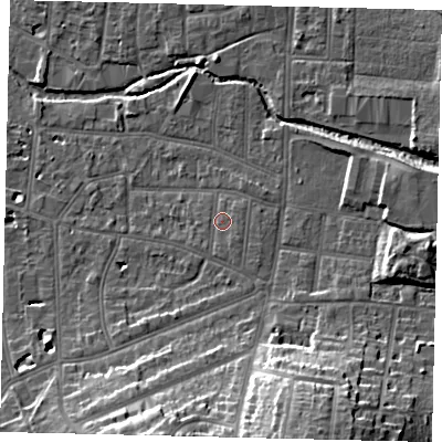 Shaded relief map of the ground around KT12UB, computed from Environment Agency LiDAR. The ground here sits at about 11 m above sea level and falls 22 m across the surrounding 800 m. Surface water reaching this point runs off ground lying to the south, 1.5 m higher.