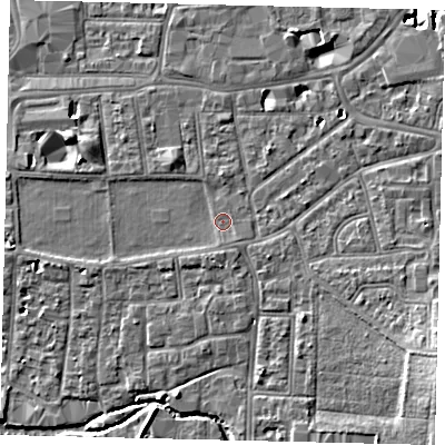 Shaded relief map of the ground around KT12UP, computed from Environment Agency LiDAR. The ground here sits at about 9 m above sea level and falls 9 m across the surrounding 800 m. Surface water reaching this point runs off ground lying to the south, 0.7 m higher.