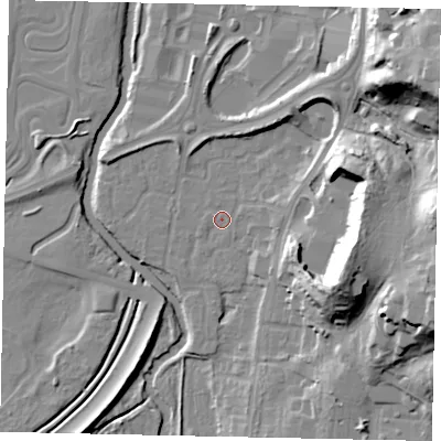 Shaded relief map of the ground around KT130UX, computed from Environment Agency LiDAR. The ground here sits at about 15 m above sea level and falls 29 m across the surrounding 800 m. Surface water reaching this point runs off ground lying to the south-south-east, 0.7 m higher.
