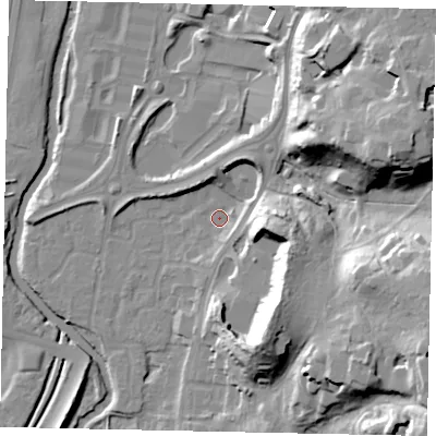 Shaded relief map of the ground around KT130XE, computed from Environment Agency LiDAR. The ground here sits at about 15 m above sea level and falls 33 m across the surrounding 800 m. Surface water reaching this point runs off ground lying to the east-north-east, 29.8 m higher.