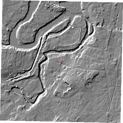 Shaded relief map of the ground around KT138FY, computed from Environment Agency LiDAR. The ground here sits at about 12 m above sea level and falls 9 m across the surrounding 800 m. Surface water reaching this point runs off ground lying to the south-east, 6.6 m higher.
