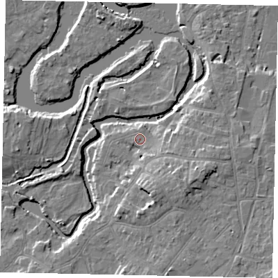 Shaded relief map of the ground around KT138JU, computed from Environment Agency LiDAR. The ground here sits at about 12 m above sea level and falls 9 m across the surrounding 800 m. Surface water reaching this point runs off ground lying to the south-east, 6.6 m higher.
