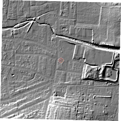 Shaded relief map of the ground around KT13AY, computed from Environment Agency LiDAR. The ground here sits at about 11 m above sea level and falls 21 m across the surrounding 800 m. Surface water reaching this point runs off ground lying to the south, 17.6 m higher.