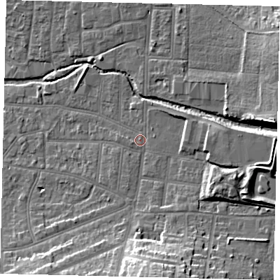 Shaded relief map of the ground around KT13BA, computed from Environment Agency LiDAR. The ground here sits at about 11 m above sea level and falls 19 m across the surrounding 800 m. Surface water reaching this point runs off ground lying to the south, 16.2 m higher.
