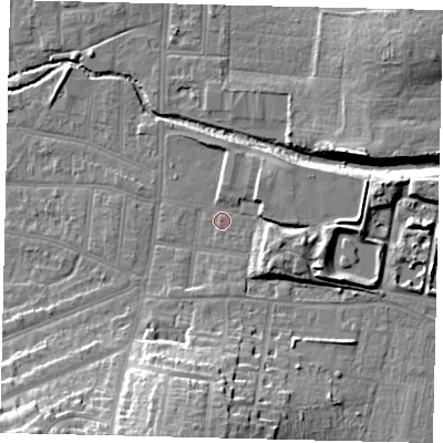 Shaded relief map of the ground around KT13BP, computed from Environment Agency LiDAR. The ground here sits at about 12 m above sea level and falls 21 m across the surrounding 800 m. Surface water reaching this point runs off ground lying to the east, 6.0 m higher.