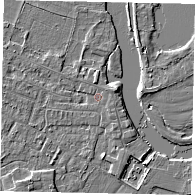 Shaded relief map of the ground around KT168FF, computed from Environment Agency LiDAR. The ground here sits at about 12 m above sea level and falls 4 m across the surrounding 800 m. Surface water reaching this point runs off ground lying to the west, 2.1 m higher.