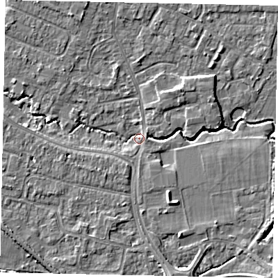 Shaded relief map of the ground around KT168HF, computed from Environment Agency LiDAR. The ground here sits at about 12 m above sea level and falls 7 m across the surrounding 800 m. Surface water reaching this point runs off ground lying to the east-north-east, 2.3 m higher.