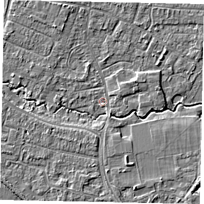 Shaded relief map of the ground around KT168HQ, computed from Environment Agency LiDAR. The ground here sits at about 12 m above sea level and falls 6 m across the surrounding 800 m. Surface water reaching this point runs off ground lying to the south-south-east, 5.7 m higher.