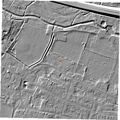 Shaded relief map of the ground around KT168JP, computed from Environment Agency LiDAR. The ground here sits at about 12 m above sea level and falls 9 m across the surrounding 800 m. Surface water reaching this point runs off ground lying to the west-north-west, 1.1 m higher.
