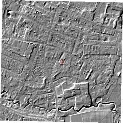 Shaded relief map of the ground around KT168JT, computed from Environment Agency LiDAR. The ground here sits at about 12 m above sea level and falls 6 m across the surrounding 800 m. Surface water reaching this point runs off ground lying to the north-north-west, 2.6 m higher.
