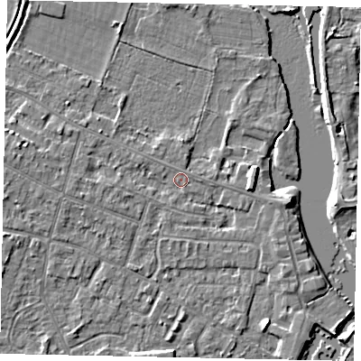 Shaded relief map of the ground around KT168LA, computed from Environment Agency LiDAR. The ground here sits at about 12 m above sea level and falls 4 m across the surrounding 800 m. Surface water reaching this point runs off ground lying to the west, 2.1 m higher.