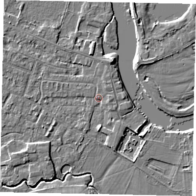 Shaded relief map of the ground around KT168LY, computed from Environment Agency LiDAR. The ground here sits at about 12 m above sea level and falls 4 m across the surrounding 800 m. Surface water reaching this point runs off ground lying to the west-north-west, 2.0 m higher.