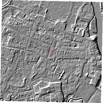 Shaded relief map of the ground around KT168NH, computed from Environment Agency LiDAR. The ground here sits at about 13 m above sea level and falls 4 m across the surrounding 800 m. Surface water reaching this point runs off ground lying to the north-west, 1.2 m higher.