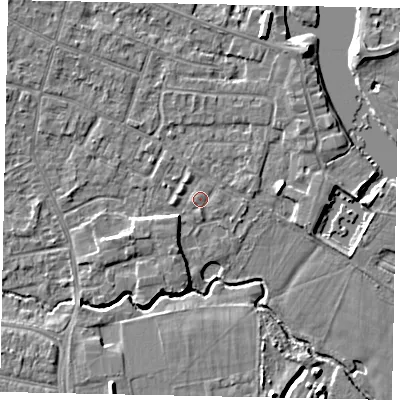 Shaded relief map of the ground around KT168QH, computed from Environment Agency LiDAR. The ground here sits at about 12 m above sea level and falls 5 m across the surrounding 800 m. Surface water reaching this point runs off ground lying to the west-south-west, 3.1 m higher.