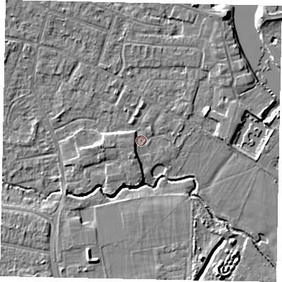 Shaded relief map of the ground around KT168QL, computed from Environment Agency LiDAR. The ground here sits at about 12 m above sea level and falls 6 m across the surrounding 800 m. Surface water reaching this point runs off ground lying to the west, 3.1 m higher.