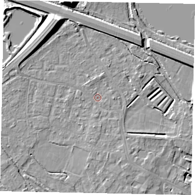 Shaded relief map of the ground around KT169DD, computed from Environment Agency LiDAR. The ground here sits at about 13 m above sea level and falls 12 m across the surrounding 800 m. Surface water reaching this point runs off ground lying to the south-east, 1.7 m higher.