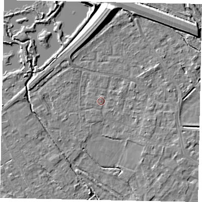 Shaded relief map of the ground around KT169DJ, computed from Environment Agency LiDAR. The ground here sits at about 13 m above sea level and falls 11 m across the surrounding 800 m. Surface water reaching this point runs off ground lying to the north, 9.3 m higher.
