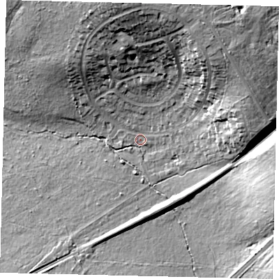 Shaded relief map of the ground around KT187HY, computed from Environment Agency LiDAR. The ground here sits at about 57 m above sea level and falls 25 m across the surrounding 800 m. Surface water reaching this point runs off ground lying to the east-north-east, 18.1 m higher.