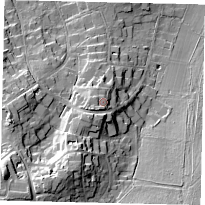 Shaded relief map of the ground around KT220SP, computed from Environment Agency LiDAR. The ground here sits at about 58 m above sea level and falls 42 m across the surrounding 800 m. Surface water reaching this point runs off ground lying to the south-west, 4.4 m higher.
