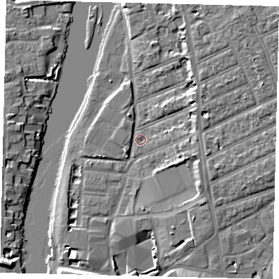 Shaded relief map of the ground around KT25AJ, computed from Environment Agency LiDAR. The ground here sits at about 6 m above sea level and falls 8 m across the surrounding 800 m. Surface water reaching this point runs off ground lying to the south-east, 4.8 m higher.