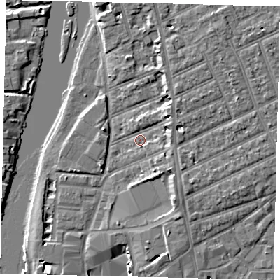 Shaded relief map of the ground around KT25AL, computed from Environment Agency LiDAR. The ground here sits at about 7 m above sea level and falls 7 m across the surrounding 800 m. Surface water reaching this point runs off ground lying to the north-east, 3.6 m higher.