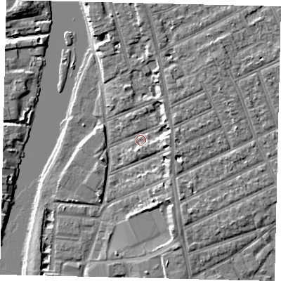 Shaded relief map of the ground around KT25AP, computed from Environment Agency LiDAR. The ground here sits at about 7 m above sea level and falls 7 m across the surrounding 800 m. Surface water reaching this point runs off ground lying to the north-east, 2.9 m higher.