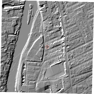 Shaded relief map of the ground around KT25AW, computed from Environment Agency LiDAR. The ground here sits at about 6 m above sea level and falls 7 m across the surrounding 800 m. Surface water reaching this point runs off ground lying to the south-east, 4.8 m higher.