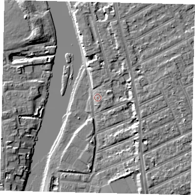 Shaded relief map of the ground around KT25AY, computed from Environment Agency LiDAR. The ground here sits at about 7 m above sea level and falls 6 m across the surrounding 800 m. Surface water reaching this point runs off ground lying to the east-north-east, 2.9 m higher.