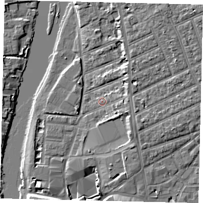 Shaded relief map of the ground around KT25JA, computed from Environment Agency LiDAR. The ground here sits at about 7 m above sea level and falls 7 m across the surrounding 800 m. Surface water reaching this point runs off ground lying to the south-east, 3.3 m higher.