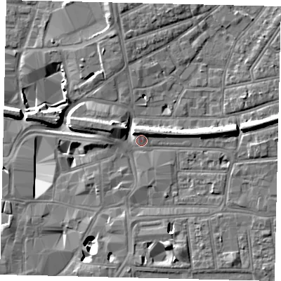 Shaded relief map of the ground around KT26BJ, computed from Environment Agency LiDAR. The ground here sits at about 9 m above sea level and falls 11 m across the surrounding 800 m. Surface water reaching this point runs off ground lying to the east, 5.0 m higher.