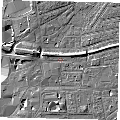 Shaded relief map of the ground around KT26RD, computed from Environment Agency LiDAR. The ground here sits at about 9 m above sea level and falls 11 m across the surrounding 800 m. Surface water reaching this point runs off ground lying to the east-north-east, 4.1 m higher.