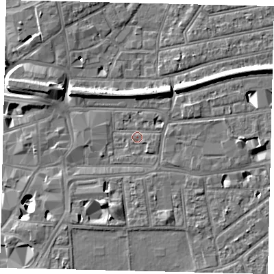 Shaded relief map of the ground around KT26RH, computed from Environment Agency LiDAR. The ground here sits at about 9 m above sea level and falls 12 m across the surrounding 800 m. Surface water reaching this point runs off ground lying to the south-south-east, 2.3 m higher.