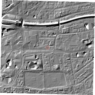 Shaded relief map of the ground around KT26RY, computed from Environment Agency LiDAR. The ground here sits at about 9 m above sea level and falls 12 m across the surrounding 800 m. Surface water reaching this point runs off ground lying to the south-south-east, 2.2 m higher.
