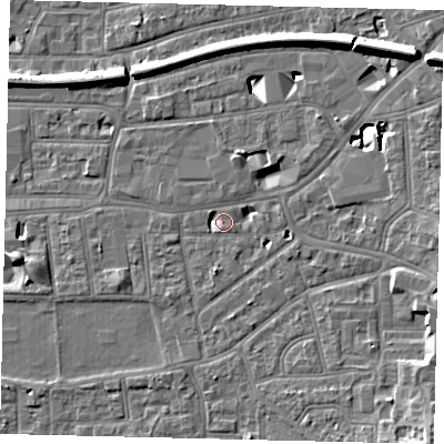 Shaded relief map of the ground around KT26TN, computed from Environment Agency LiDAR. The ground here sits at about 9 m above sea level and falls 11 m across the surrounding 800 m. Surface water reaching this point runs off ground lying to the south-east, 8.7 m higher.