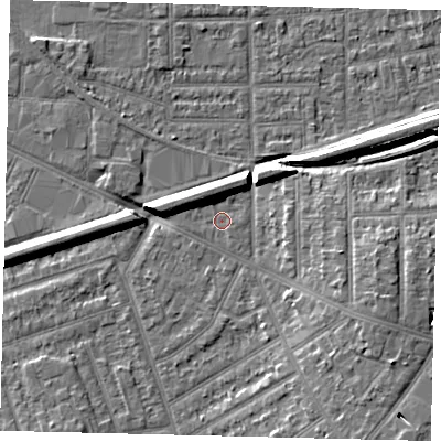 Shaded relief map of the ground around KT33NU, computed from Environment Agency LiDAR. The ground here sits at about 15 m above sea level and falls 8 m across the surrounding 800 m. Surface water reaching this point runs off ground lying to the west-north-west, 5.0 m higher.