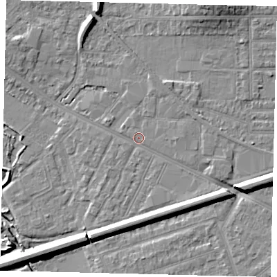 Shaded relief map of the ground around KT33SX, computed from Environment Agency LiDAR. The ground here sits at about 15 m above sea level and falls 11 m across the surrounding 800 m. Surface water reaching this point runs off ground lying to the south-east, 5.3 m higher.