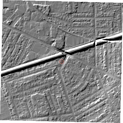 Shaded relief map of the ground around KT35AQ, computed from Environment Agency LiDAR. The ground here sits at about 15 m above sea level and falls 7 m across the surrounding 800 m. Surface water reaching this point runs off ground lying to the north-west, 6.2 m higher.