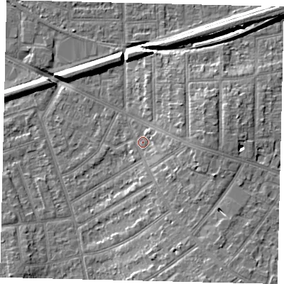 Shaded relief map of the ground around KT35BE, computed from Environment Agency LiDAR. The ground here sits at about 16 m above sea level and falls 9 m across the surrounding 800 m. Surface water reaching this point runs off ground lying to the east-south-east, 4.9 m higher.