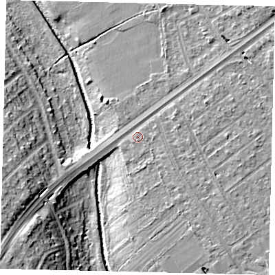 Shaded relief map of the ground around KT35QP, computed from Environment Agency LiDAR. The ground here sits at about 18 m above sea level and falls 18 m across the surrounding 800 m. Surface water reaching this point runs off ground lying to the north-east, 4.7 m higher.