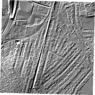 Shaded relief map of the ground around KT36JT, computed from Environment Agency LiDAR. The ground here sits at about 16 m above sea level and falls 8 m across the surrounding 800 m. Surface water reaching this point runs off ground lying to the south, 2.4 m higher.
