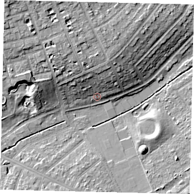 Shaded relief map of the ground around KT59AA, computed from Environment Agency LiDAR. The ground here sits at about 22 m above sea level and falls 17 m across the surrounding 800 m. Surface water reaching this point runs off ground lying to the north, 7.7 m higher.