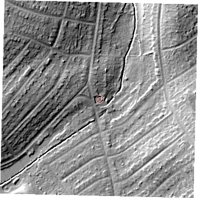 Shaded relief map of the ground around KT59EA, computed from Environment Agency LiDAR. The ground here sits at about 18 m above sea level and falls 18 m across the surrounding 800 m. Surface water reaching this point runs off ground lying to the north-west, 2.7 m higher.
