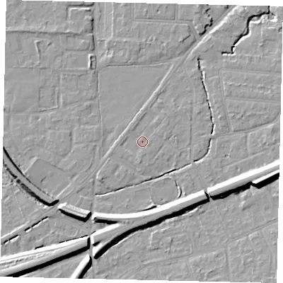 Shaded relief map of the ground around KT70AT, computed from Environment Agency LiDAR. The ground here sits at about 11 m above sea level and falls 13 m across the surrounding 800 m. Surface water reaching this point runs off ground lying to the south, 1.5 m higher.