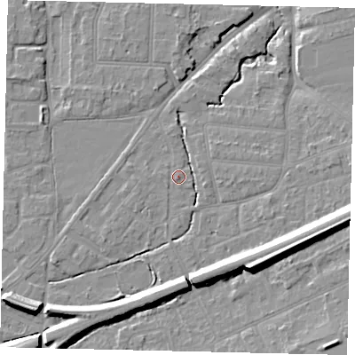 Shaded relief map of the ground around KT70AU, computed from Environment Agency LiDAR. The ground here sits at about 11 m above sea level and falls 13 m across the surrounding 800 m. Surface water reaching this point runs off ground lying to the south-east, 10.6 m higher.