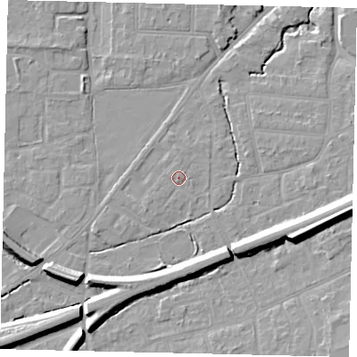 Shaded relief map of the ground around KT70AX, computed from Environment Agency LiDAR. The ground here sits at about 11 m above sea level and falls 13 m across the surrounding 800 m. Surface water reaching this point runs off ground lying to the south-west, 0.7 m higher.