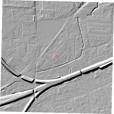 Shaded relief map of the ground around KT70AY, computed from Environment Agency LiDAR. The ground here sits at about 11 m above sea level and falls 12 m across the surrounding 800 m. Surface water reaching this point runs off ground lying to the west-south-west, 1.0 m higher.