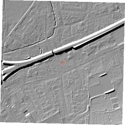 Shaded relief map of the ground around KT70BA, computed from Environment Agency LiDAR. The ground here sits at about 11 m above sea level and falls 15 m across the surrounding 800 m. Surface water reaching this point runs off ground lying to the south-east, 12.5 m higher.